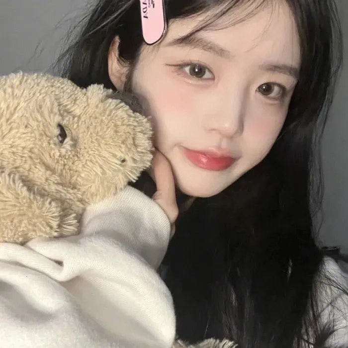 彼女